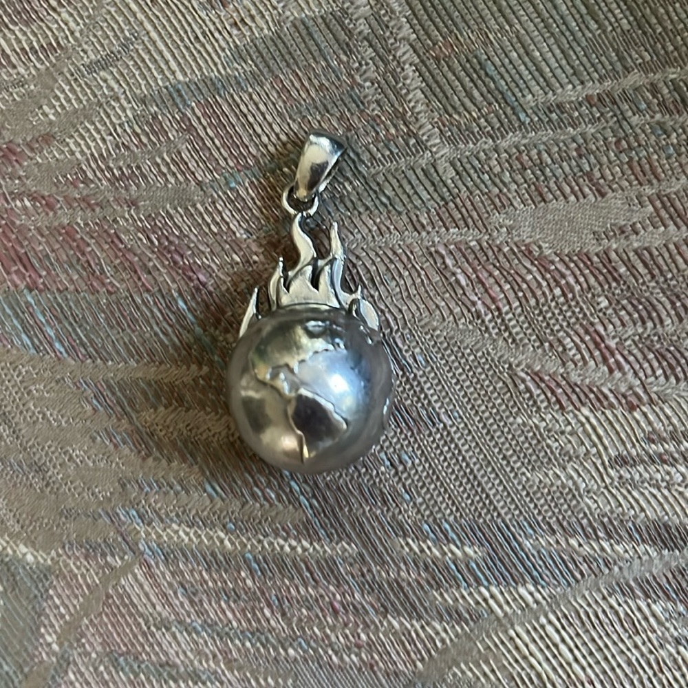 Hard Jewelry world on fire pendant